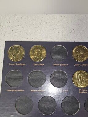 A Coin History of the U.S. Presidents Collector Folder w/ 12 coins